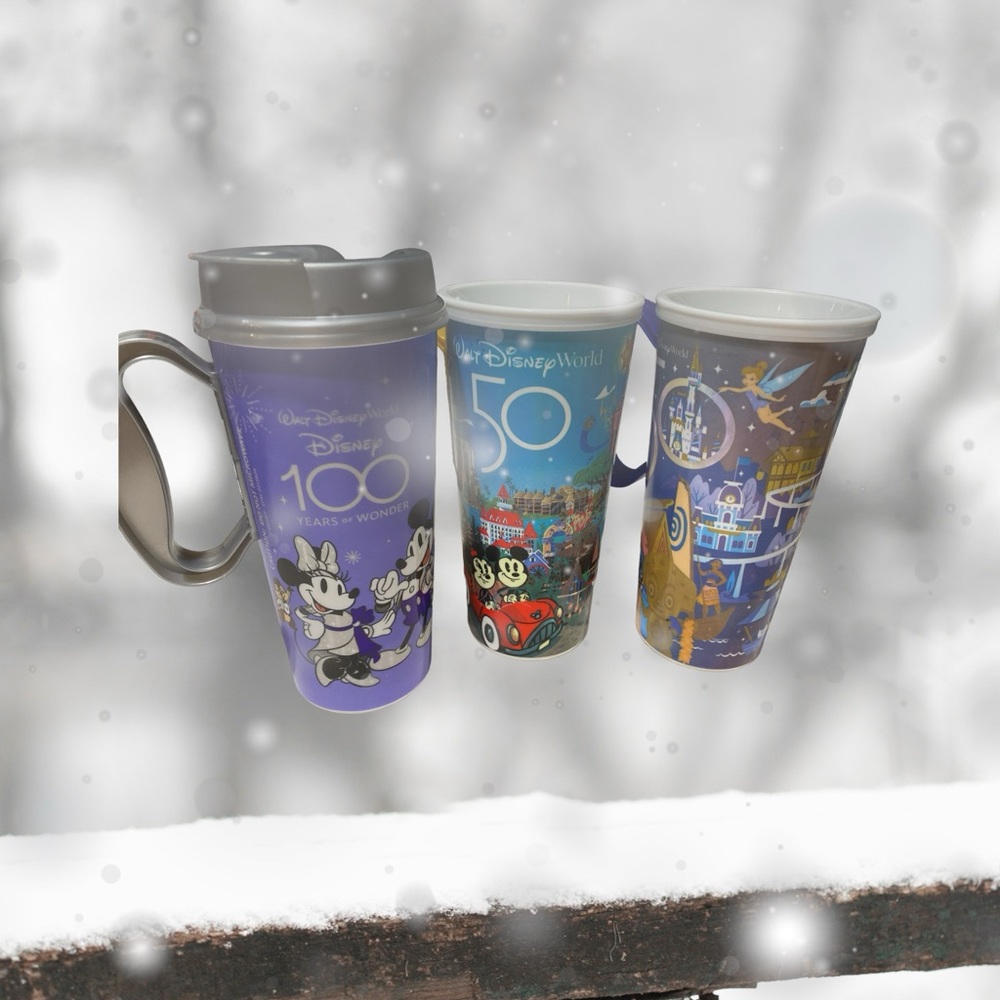 Three Disney 7 inch 50 anniversary cups.  One has too